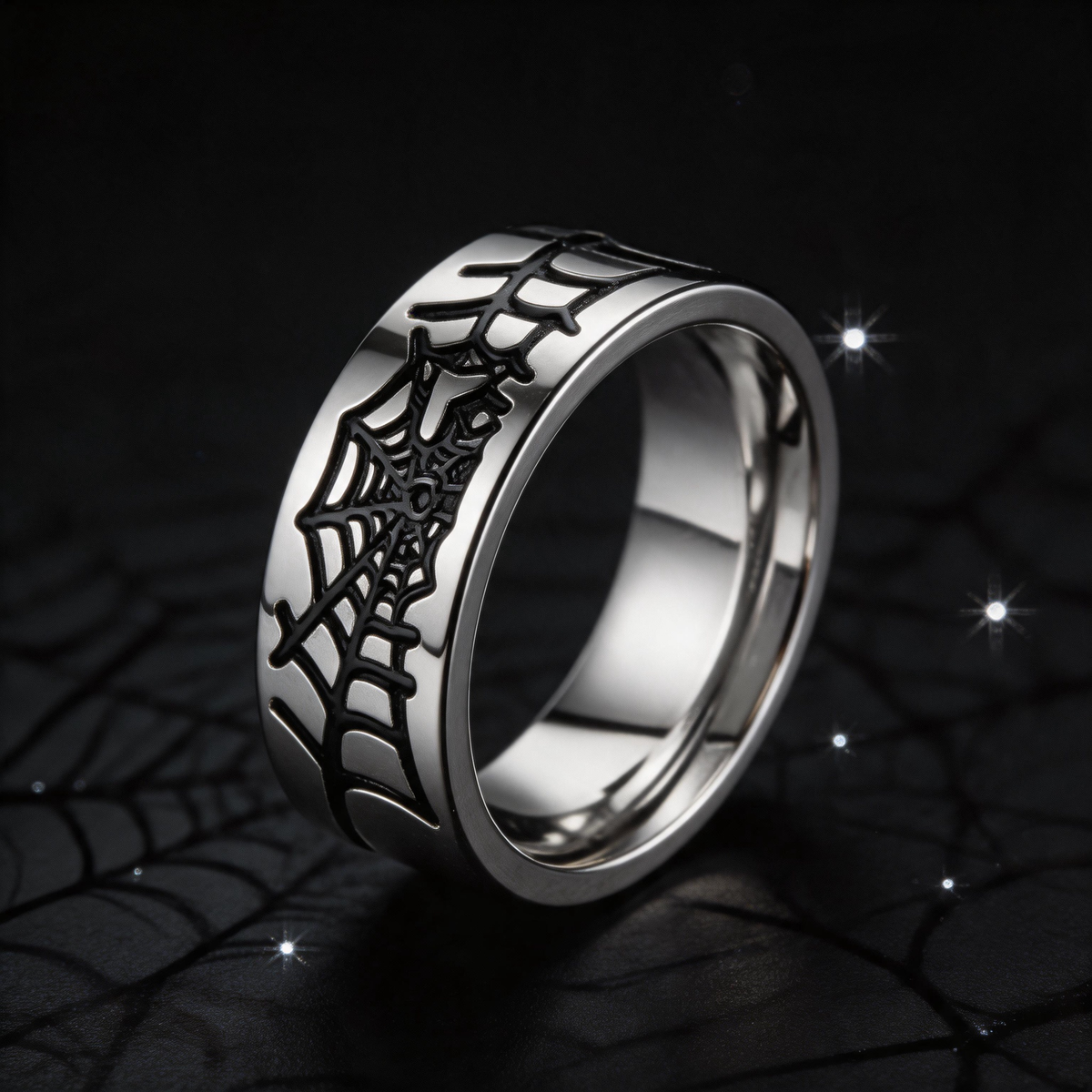 Spiderweb band ring worn with a black leather jacket